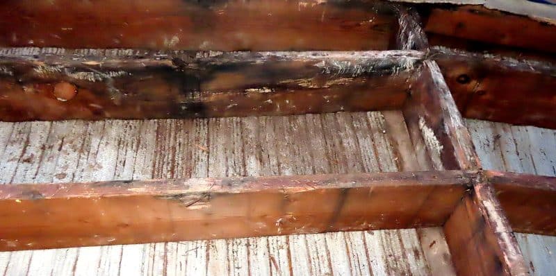 California SB-326 balcony inspection — moisture-damaged wood framing at an exterior elevated element
